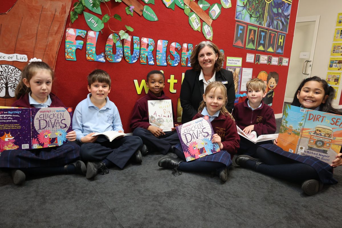 A teacher exemplifying one of the 10 essential classroom management skills as her class is focused and organised.