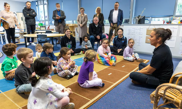 A teacher exemplifying one of the 10 essential classroom management skills as her class is focused and organised.