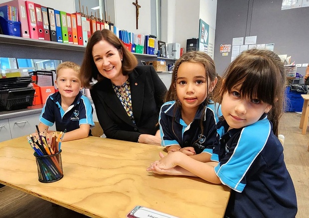 A teacher exemplifying one of the 10 essential classroom management skills as her class is focused and organised.