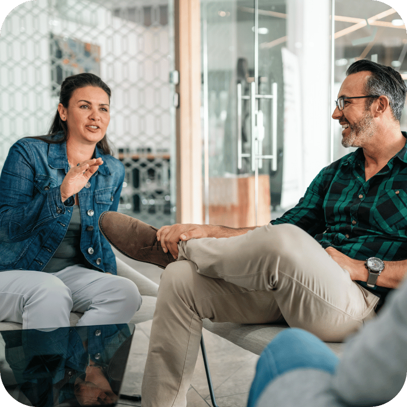 one-on-one-coaching a female and male sitting down having a conversation