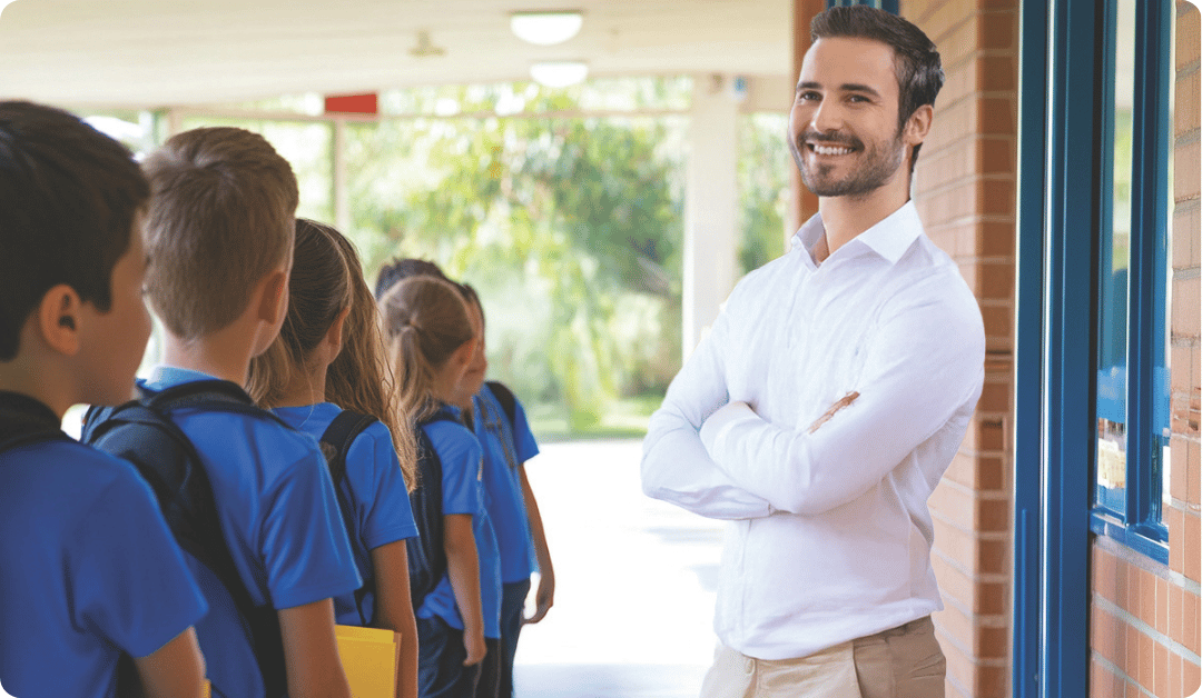 Confident teacher managing his class